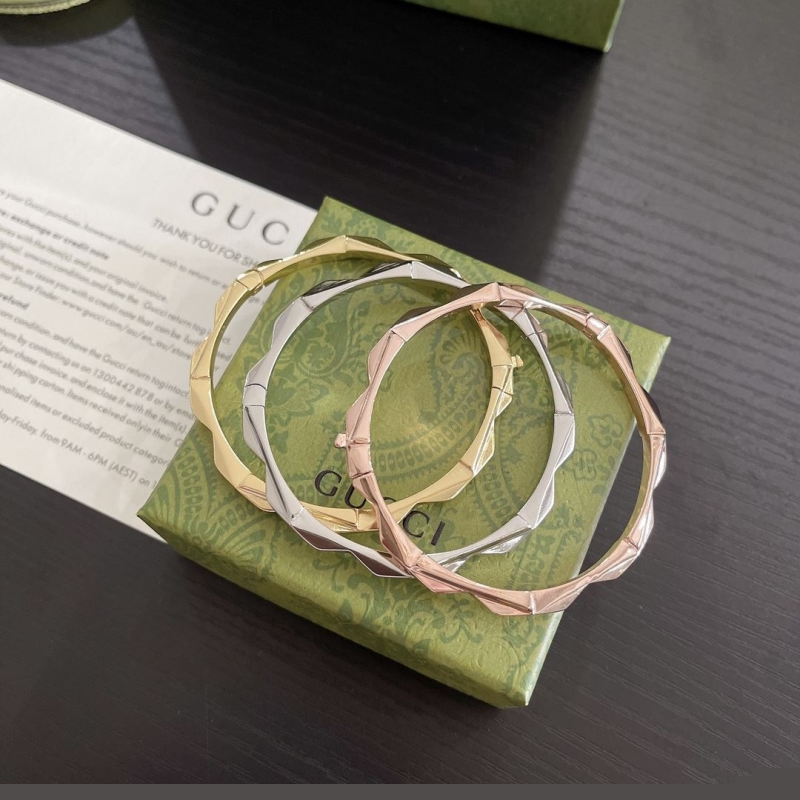 G*u*i bracelets